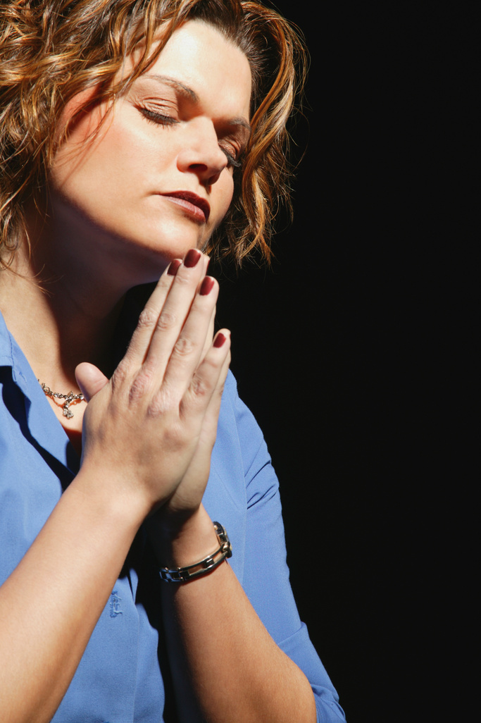 Devoted Woman in Prayer