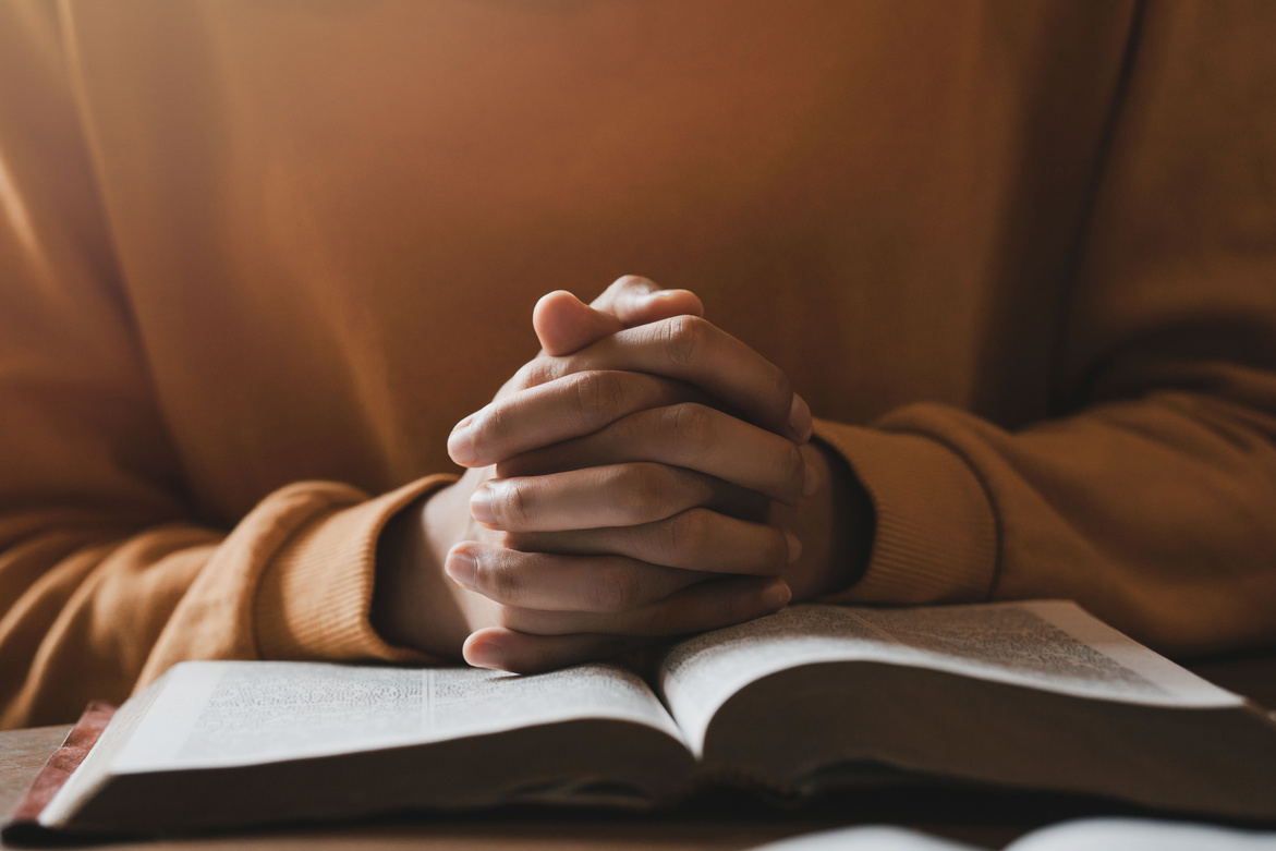 girl praying thanksgiving with holy scriptures God's teachings based on faith and faith in God Religious concepts, beliefs, hopes, love