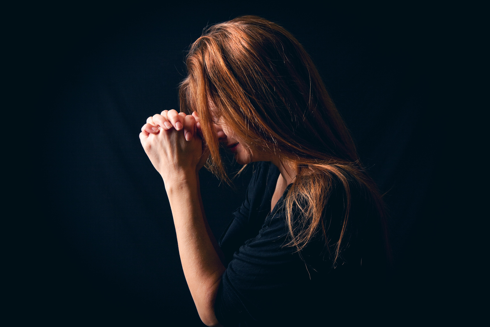 Crying Woman Saying Prayer